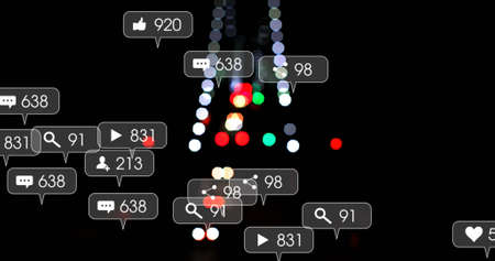 Image of social media icons and numbers over out of focus city and car lights. global social media, connections and digital interface concept digitally generated image.の写真素材