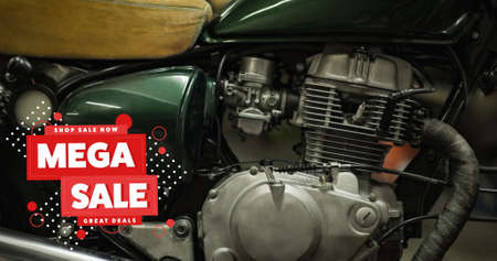 Digital composite image of mega sale text sign over motorcycle engine. discount and transportation, sale.の写真素材