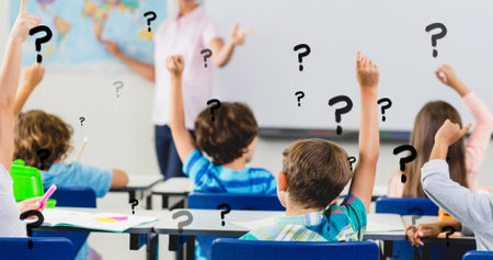 Digital composite of question marks over students with hands raised answering teacher in classroom. education and knowledge.の写真素材