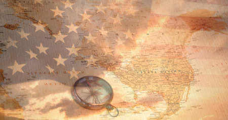Double exposure of compass with american flag and map. digital composite of identity and discoveryの写真素材
