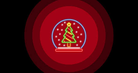 Digital composite of illuminated christmas tree on red circular pattern over black background. celebration, decoration and culture.の写真素材