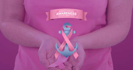 Composite image of woman with pink ribbon on anchor and breast cancer awareness text. breast cancer awareness campaign and vector concept.の写真素材