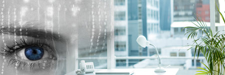 Composite image of binary coding data processing over close up of a female eye and office interior. business and biometric scanning technology conceptの写真素材