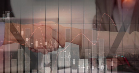 Image of statistics and financial data processing over business people shaking hands. global business, connections and data processing concept digitally generated image.の写真素材