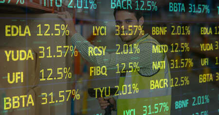 Image of data processing over man working in warehouse. global shipping, delivery and connections concept digitally generated image.の写真素材