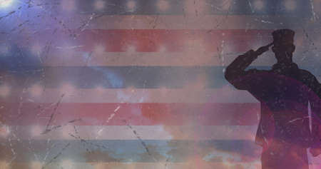 Image of male soldiers saluting over american flag. patriotism, armed forces and homecoming concept digitally generated image.の写真素材