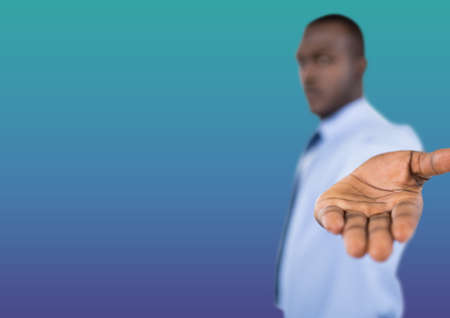 African american businessman with cupped hand with copy space on green gradient background. business and office conceptの写真素材