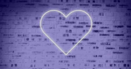 Image of neon heart icon over brick wall purple background. social media, connections and digital interface concept digitally generated image.の写真素材