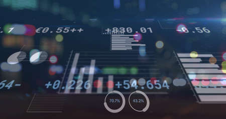Image of financial data processing over out of focus city road lights. global business and finance concept digitally generated image.の写真素材
