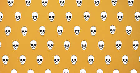 Composition of skull icons repeated on orange background. halloween, tradition and celebration concept digitally generated image.の写真素材