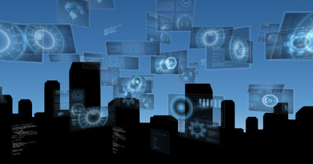 Image of data processing on screens over cityscape. digital interfaces concept and connections...