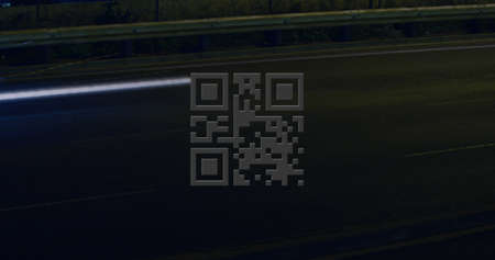 Image of glowing qr code over red light trails. global online security and data processing concept...