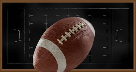 Image of american football over drawing of game plan. sports and competition concept digitally generated image.の写真素材