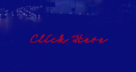 Image of click here text over cityscape at night on blue background. social media and communication interface concept digitally generated image.の写真素材