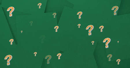 Image of question marks over green background. education, knowledge and school concept digitally generated image.の写真素材