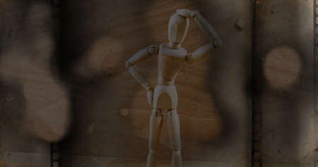 Image of film stock over mannequin. mental health awareness week and celebration concept digitally...