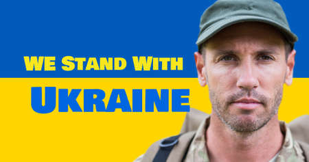 Portrait of caucasian army soldier by we stand with ukraine text over flag. digital composite, patriotism, identity and war concept.の写真素材