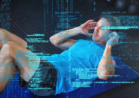 Data processing against caucasian fit man performing crunches exercise at the gym. sports, fitness...