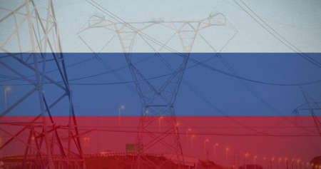 Image of flag of russia over electricity pole and traffic at sunset. ukraine crisis and...