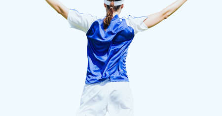 Rear view of female athlete celebrating against copy space on white background. sports, competition and tournament conceptの写真素材