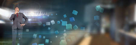 Blurred effect with copy space against caucasian businessman and sports stadium. business and sports conceptの写真素材