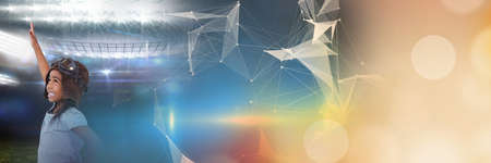 Blurred effect with copy space against african american boy doing flying gesture and sports field. sports and technology conceptの写真素材