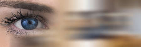 Blurred effect with copy space against close up of female eye. cyber security and business technology conceptの写真素材