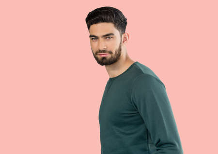 Portrait of caucasian young man against copy space on pink background. people and emotions conceptの写真素材