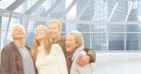 Composite image of caucasian family smiling together against view of cityscape from office window....