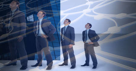 Composition of network of connections over businessmen over cityscape. global online business, networking and digital interface concept digitally generated image.の写真素材