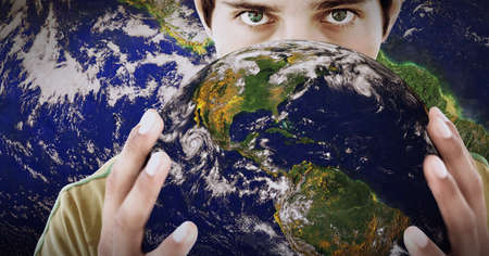 Composition of portrait of man holding globe. global environment, finance and networking concept...