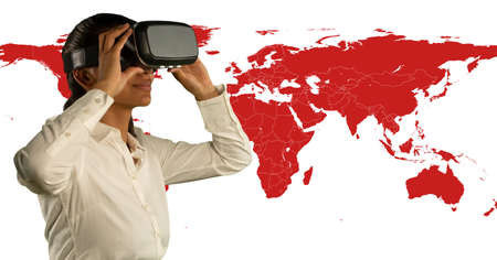 African american woman wearing vr headset against world map on white background. global networking and technology conceptの写真素材