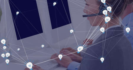 Network of connections against caucasian female customer care executive working at office. global...