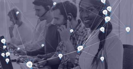 Network of connections against african amercan female customer care executive working at office....