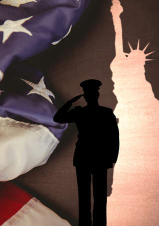 Soldier saluting against us flag and statue of liberty on grey background with copy space. american...