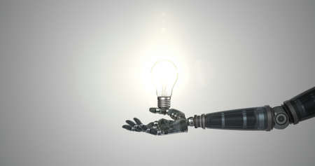 Digitally generated image of robotic hand presenting illuminated bulb against white background