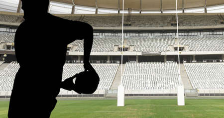 Image of confetti and try text over rugby player with ball at stadium. sport and social media concept digitally generated image.の写真素材