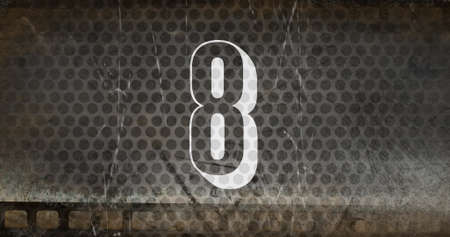 3d countdown image sizzling against a grey fence in backgroundの写真素材