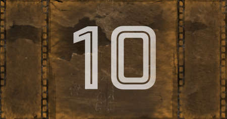 Digital composite of vintage film countdown image with flickering in foreground