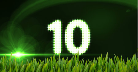 Animated countdown with lights and grass against digital animated background 4kの写真素材