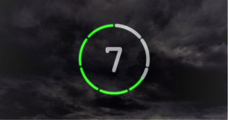 Animated black and white countdown against animated clouds backgroundの写真素材