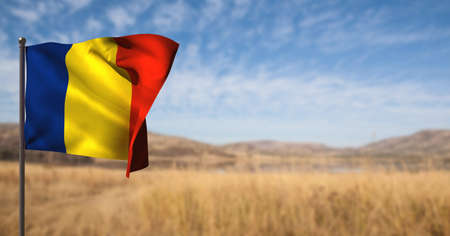 Composite image of waving romania flag against landscape with grassland and mountains. national tourism conceptの写真素材