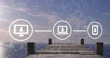 Image of network of connections and icons over bridge. global business, finances, data processing...