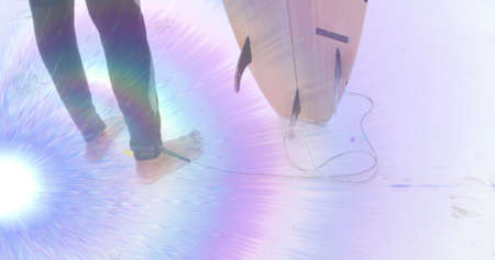 Image of light moving over feet of surfer on beach holding surfboard. holidays, healthy, active...