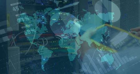 Financial data processing over world map against person working in server room. global finance and cyber security technology conceptの写真素材