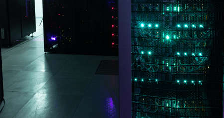 Image of empty corridor with rows of red and green lights in computer servers. global technology,...