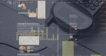 Image of graphs and financial data over payment terminal. finance, economy, contactless payments and technology concept digitally generated image.の写真素材
