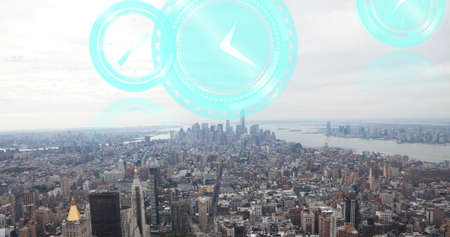 Image of moving clocks over cityscape. global business, data processing and digital interface...