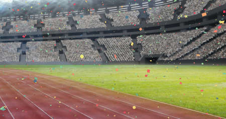 Image of confetti falling over sports stadium. sports, celebration and competition concept digitally...