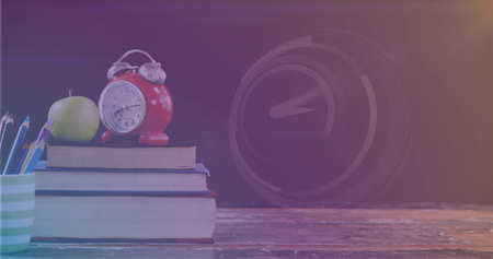 Image of clock and books over black background. global business and digital interface concept...
